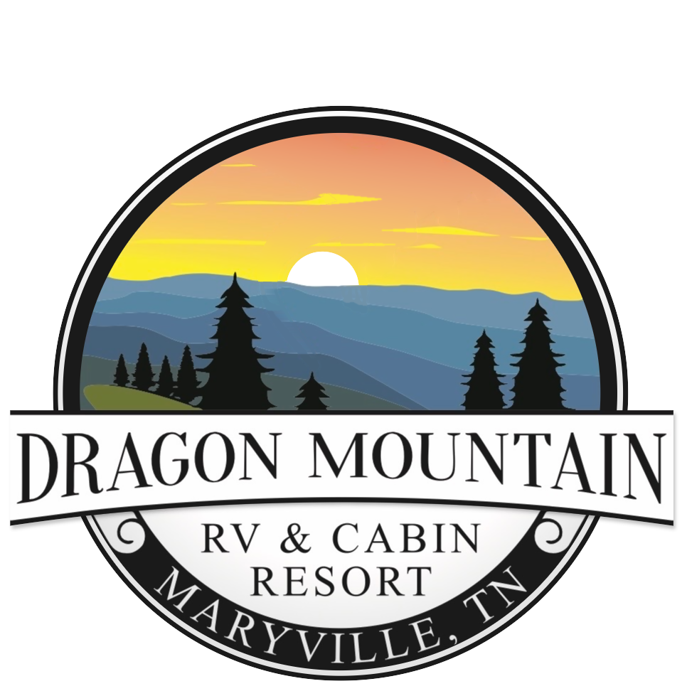 The resort logo: a black dragon flying over a round badge of a mountain sunset, with the words Dragon Mountain RV & Cabin Resort, Maryville, TN