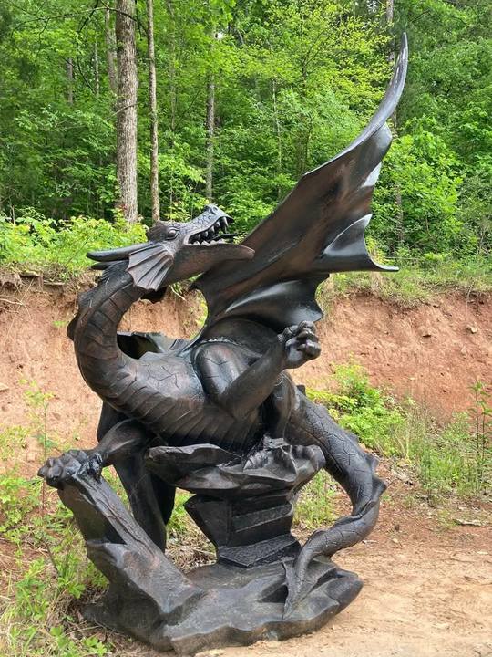 Close-up of the dragon statue with its wings raised